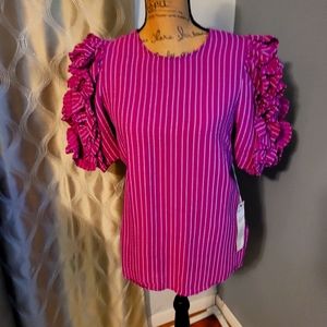 Beautiful ruffled sleeve blouse. Kate